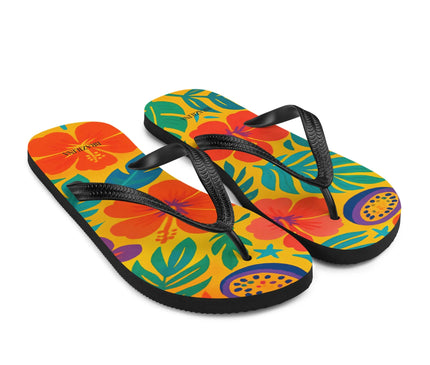 Tongs aux motifs tropicaux et vibrants inspirés du Brésil, avec des dessins de fleurs exotiques, de feuilles luxuriantes et de fruits colorés, parfaites pour un style estival et décontracté. Idéal pour la plage ou les journées ensoleillées.